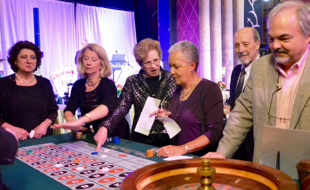 Fun at the roulette table: Celeste Seitz, Donna Saunders, Brenda Rocconi-Gallegos, Chester River Health Foundation Board members Sandra Bjork and Carl Gallegos, and Max Ruehrmund.