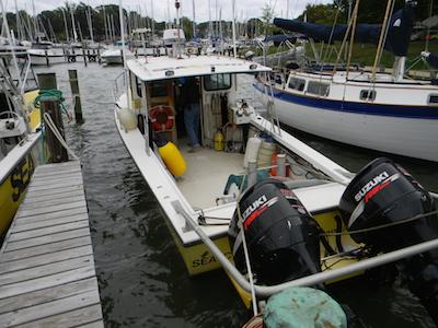 Sea Tow Annapolis’s 29-foot long Sea-Cure boasts 900 feet of rope, two water pumps, fuel cans, buoys and life preserves to assist in whatever situation arises on September 24 at the Watergate Village docks in Annapolis, Maryland. Capital News Service photo by Dylan Moroses