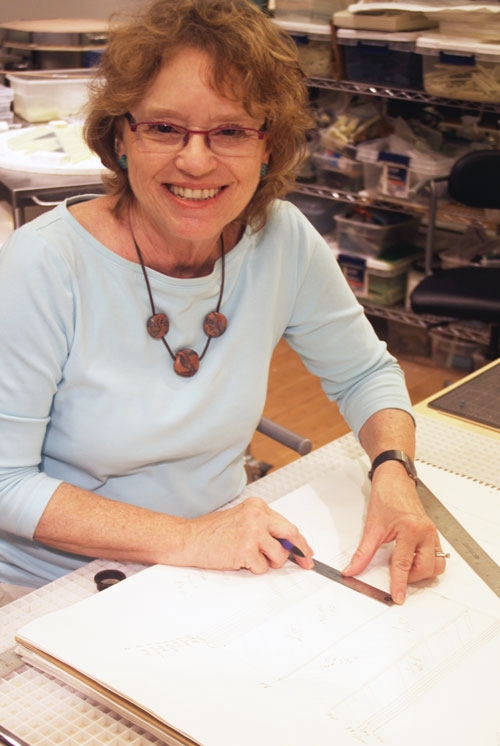 Patti Hegland at her design table.
