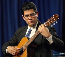 Rafael Scarfullery, the guitarist and composer who will conduct the 50+ guitar orchestra on stage during the LAGQ's performance of Shiki. 