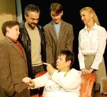  Grandma Kurnitz (Kathy Jones) gives her family, left to right grandson Arty (Zachary Goss), son Eddie (Jeff Daly), grandson Jay (Tim Daly) and daughter Gert (Rachel Goss) reasons why the boys should not live with her in Neil Simon’s play Lost In Yonkers which plays weekends, January 16 through February 1, 2015 at Church Hill Theatre.