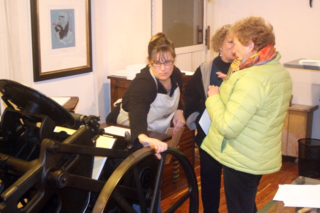 Jodi Bortz shows off the magic of letterpress printing at Haywire Letterpress on First Friday open house.
