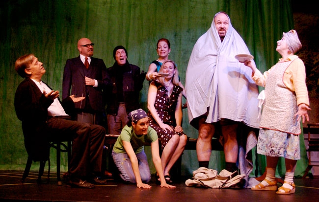 The cast,left to right, Lloyd (Will Robinson), Roger/Gary (Ricky Vitanovic), Burglar/Selsdon (Pat Patterson), Poppy (Christine Kinlock),Vivki/Brooke (Heather Oland), Flavia/Belinda (Jane Copple), Philip/Frederick (Patrick Fee), and Mrs. Clackett/Dottie (Maggie Garey) help Selsdon deliver the last line of the play, "A good old fashioned plate of sardines."