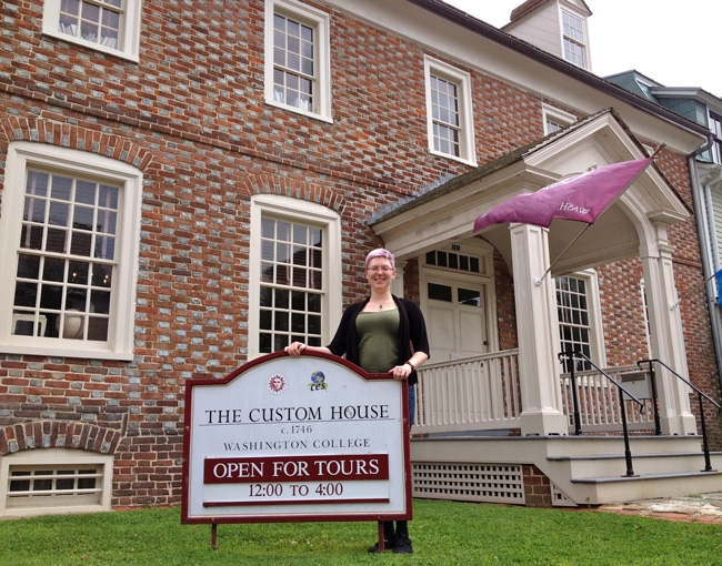 Student tour manager Michelle Ramstack stands outside the Custom House, where the free audio tours of Chestertown's colorful history begin. 