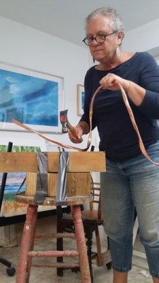 Cindy Fulton bends copper for her outdoor sculpture