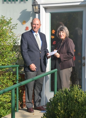  QAC Arts Council President – Tom Helfenbein(left) presents grant award to Kent Island Federation of Arts President – Judy Wolgast (right) 
