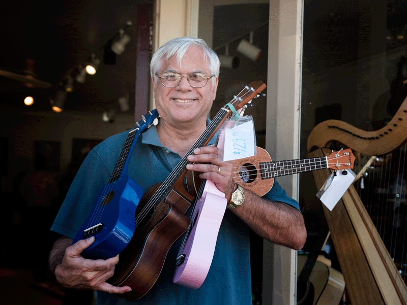 Bill Drazga, with many ukuleles.