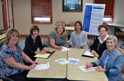 Members of the Hospice of Queen Anne’s management team meet to discuss expansion of services to patients and families in Caroline and Kent Counties. Pictured are (left to right) Kenda Leager, development officer; Linda Mastro, marketing and communications director; Kathy Deoudes, board chair; Heather Guerieri, executive director; Lori Collier, director, clinical services; and Sharon Loving, support services supervisor. 