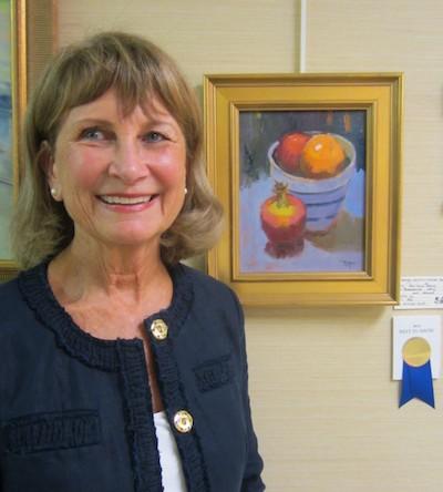 Best in Show winner for WAF's 2015 Memorial Show at Heron Point, Patti Lucas Hopkins and her oil painting, "Pomegranate, Apple and Orange"